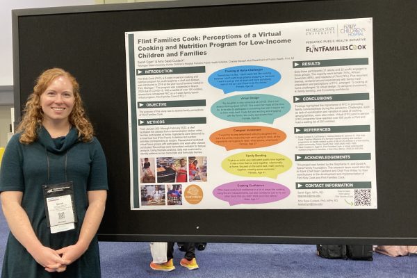 Sarah Egan presenting about Flint Families Cook at the Food and Nutrition Conference and Expo in 2024.