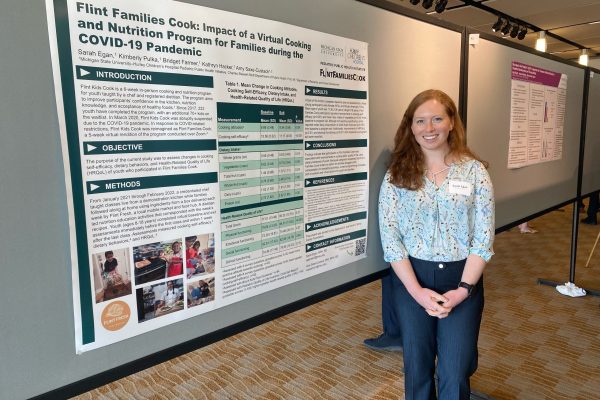 Sarah Egan presenting about Flint Families Cook at Great Lakes Pediatric Research Day in 2023.