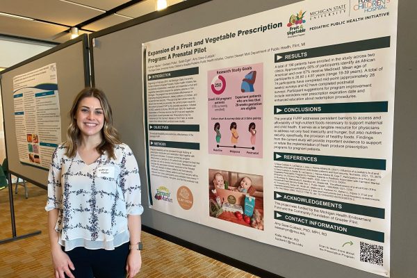 Katie Hacker presenting about the Prenatal Fruit and Vegetable Prescription Program at Great Lakes Pediatric Research Day in 2023.