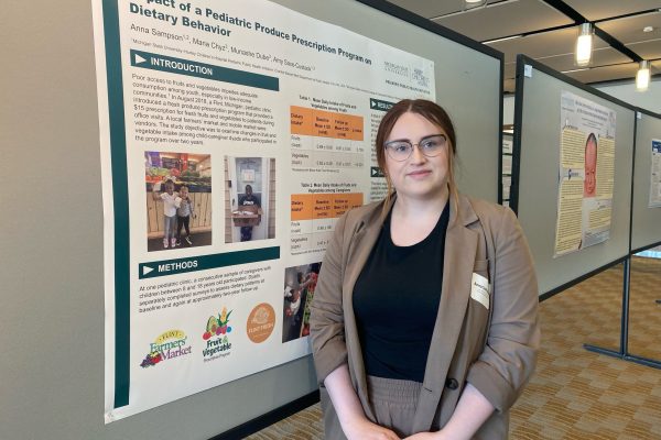 Anna Sampson presenting about the Fruit and Vegetable Prescription Program at Great Lakes Pediatric Research Day in 2023.